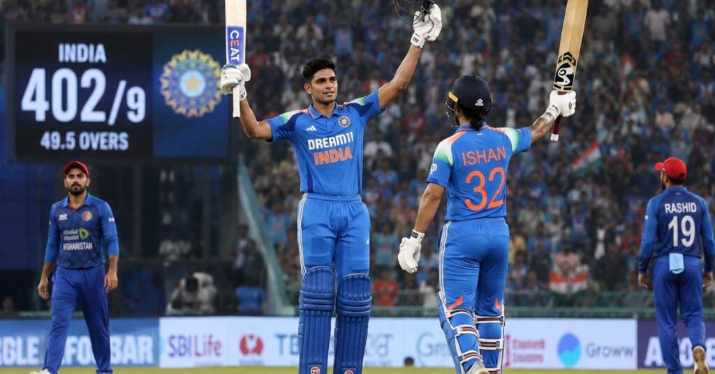 Shubman Gill and Ishan Kishan celebrating with raised bats after scoring centuries during India’s 402-run total against Afghanistan in the IND vs AFG 2nd ODI at Ekana Cricket Stadium