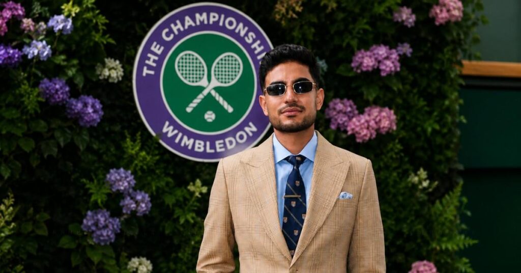 Shubman Gill poses in front of the Wimbledon Championships floral display after receiving a prestigious Royal Box invitation during the 2026 tournament.
