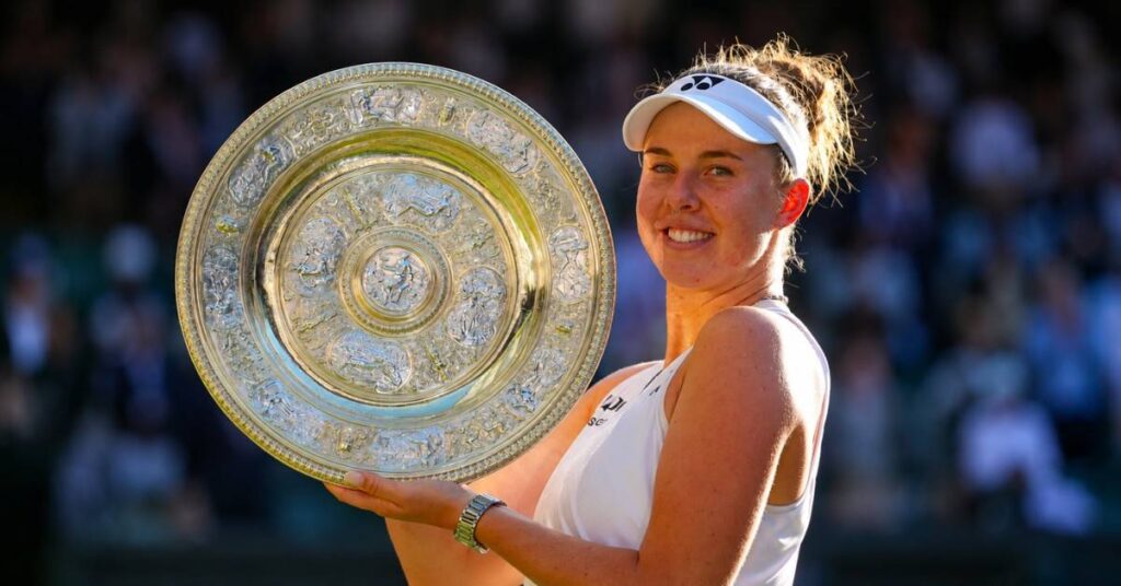 Linda Nosková poses with the Venus Rosewater Dish after defeating Karolína Muchová to win the Wimbledon 2026 Ladies' Singles title at the All England Club.