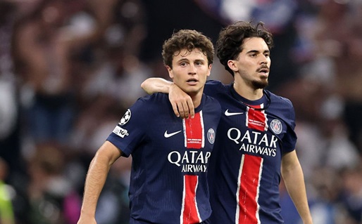 Vitinha and João Neves in PSG kits during a match. Vitinha and João Neves in PSG kits during a match.