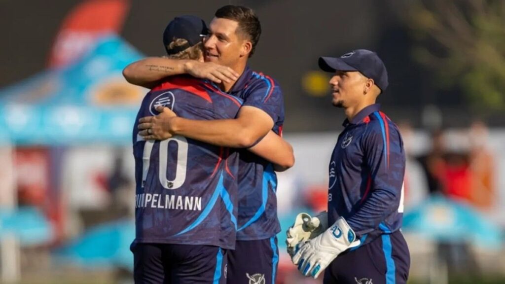 JJ Smit hugging Ruben Trumpelmann after taking wickets in the Namibia vs South Africa T20I Tri-Series. JJ Smit hugging Ruben Trumpelmann after taking wickets in the Namibia vs South Africa T20I Tri-Series.