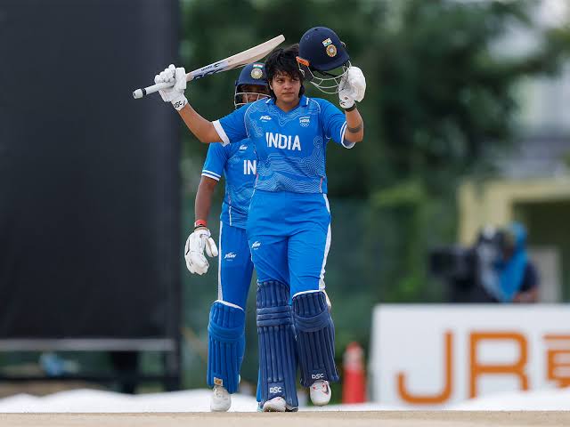 Shafali Verma raising her bat after scoring 100 runs in Asian Games 2026 Semifinal Shafali Verma raising her bat after scoring 100 runs in Asian Games 2026 Semifinal