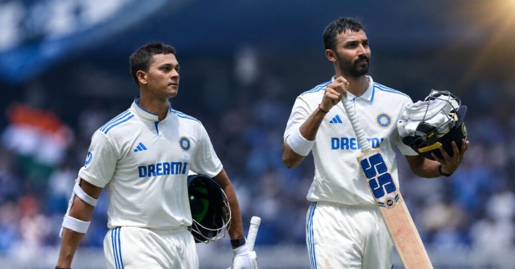 Yashasvi Jaiswal and Devdutt Padikkal walking off the field together in white India Test match kits.
